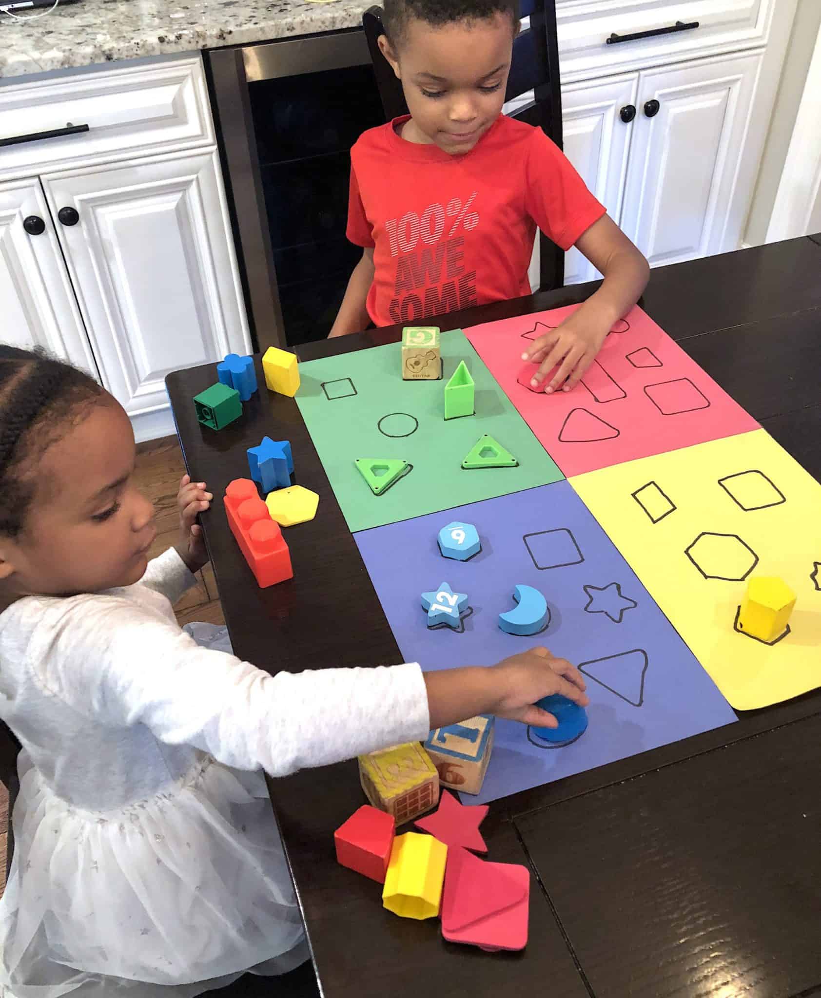 Toddler Learning Activities that involve shapes are an absolute must. Easy toddler activities that include colors are awesome as well. This sorting activity combines the two!