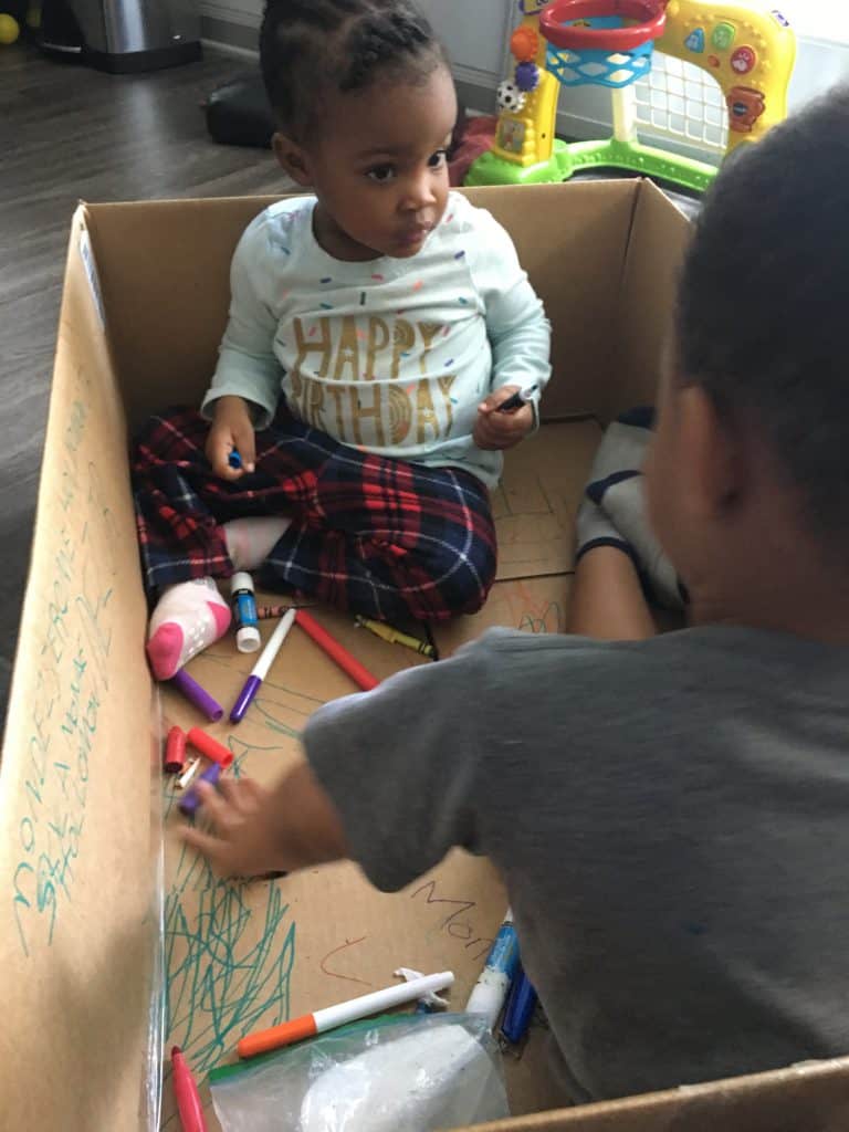 How to Make an Outdoor Easel - Busy Toddler