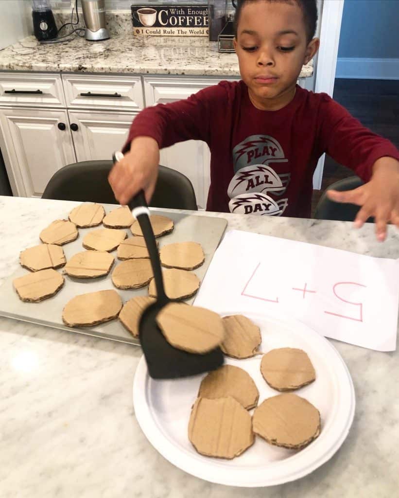 Fun Preschool learning activities are a great way to get your kids interested in math! Pretend play preschool activities combined with preschool math games will be a hit. My toddler enjoyed this activity idea too.