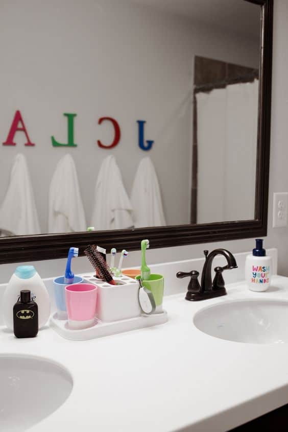 https://keeptoddlersbusy.com/wp-content/uploads/2020/06/shared-bathroom-toothbrush-holder.jpg