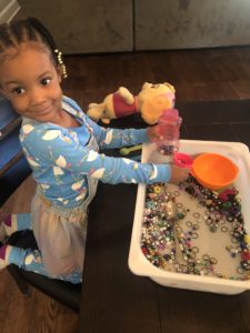 Looking for an Awesome Sensory Activity for Toddlers? Well This Bean Sensory Activity Is An Absolute Must! This Bead Sensory Bin Activity Is A Super Easy Way To Have Tons of Fun.
