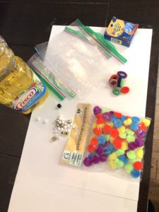 Sensory Activities For Toddlers Are An Absolute Must For Early Development Through Play And Good Plain Fun! This Easy Pom Pom Sensory Bag Is Super Easy and Cool. Great Sensory Bags for Babies Too!