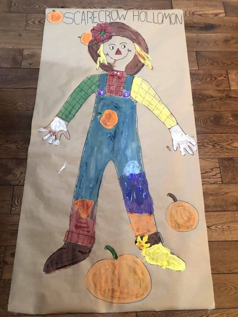 This Giant Scarecrow is Such A Fun Fall Craft Idea For Kids! Fall Crafts Are Awesome, But This Activity Is One Of The Best. It's Great For All Ages and Occupies The Kids For A Great Family Activity.