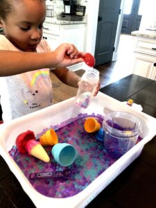 Looking for Sensory Activities That Toddlers Will Love? Well Check Out This Water Bead Sensory Bin Activity That Will Keep Your Child Occupied and Learning!
