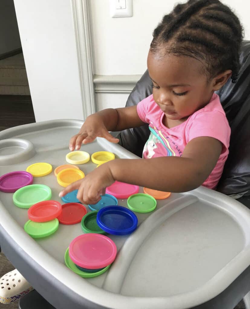 Toddlers playing with store playdough